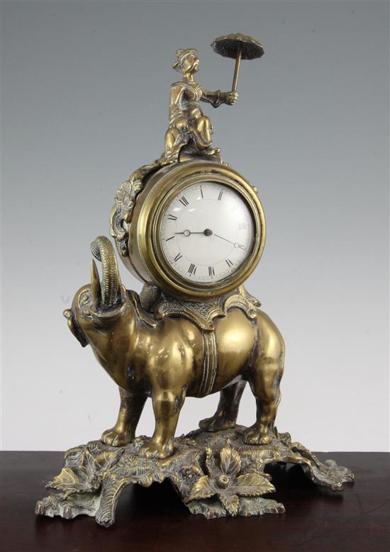 A French bronze mantel timepiece modelled as a Chinaman riding an elephant, 16in.